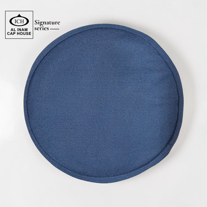 Top view of AL INAM Blue Islamic cap featuring clean pattern and breathable cotton construction.