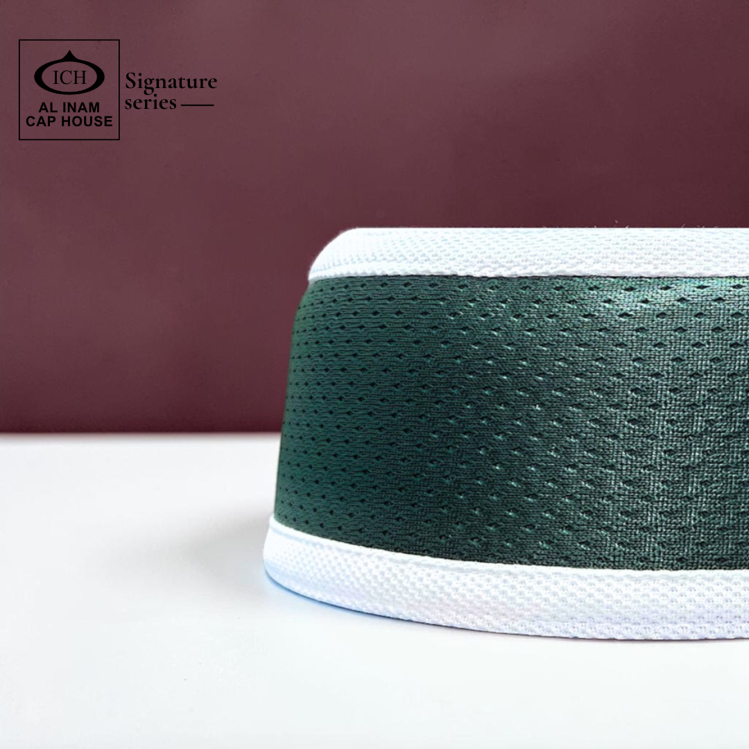 Side view of AL INAM Green and White kufi cap showing flexible fit and lightweight comfort.