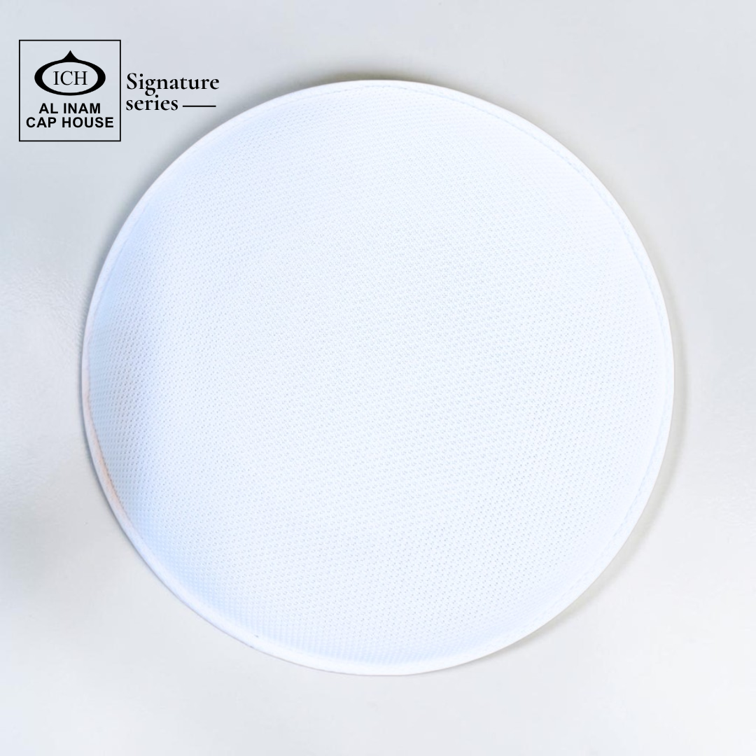 Top view of AL INAM Green and White Islamic cap featuring clean pattern and breathable cotton fabric.