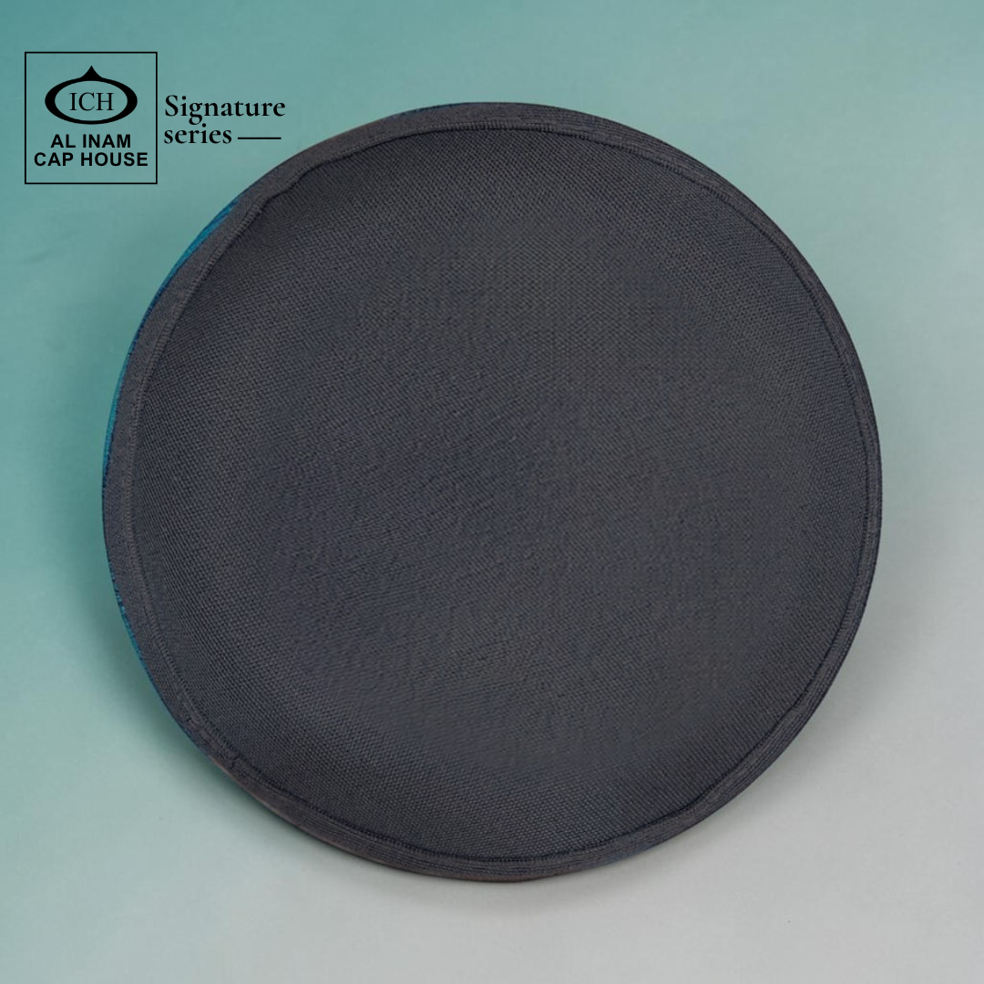 Top view of AL INAM Turquoise and Gray Islamic cap with modern pattern and lightweight breathable fabric.