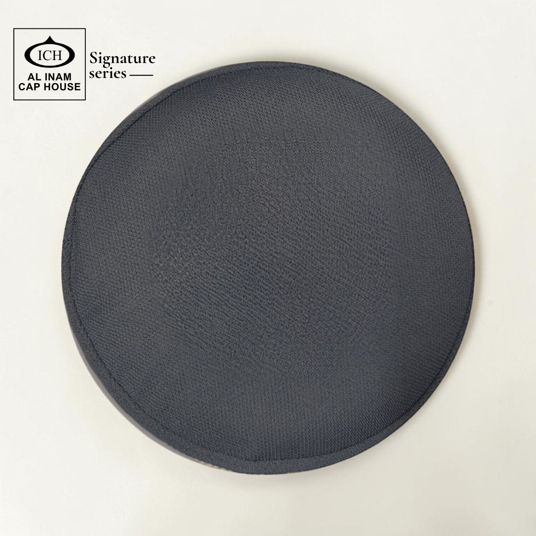 Top view of AL INAM White and Light Gray Islamic cap featuring subtle pattern, breathable cotton and lightweight design.
