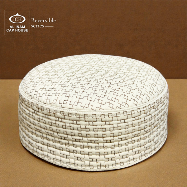 Top front perspective of AL INAM ICH Reversible Islamic Kufi Cap featuring structured traditional pattern, fine stitching craftsmanship, soft breathable material, ideal skull cap for masjid and special Islamic occasions.