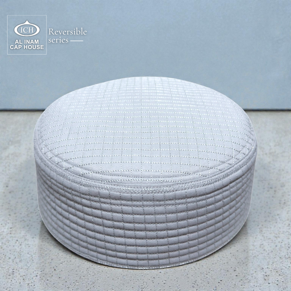 Top front structure view of AL INAM ICH Reversible Islamic Kufi Cap showcasing fine stitching, traditional Islamic pattern, soft cotton material and structured fit suitable for masjid and religious gatherings.