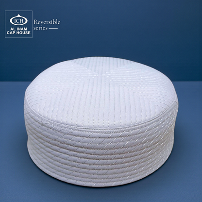 Top front angle of AL INAM ICH Reversible Muslim Kufi Cap highlighting fine stitching, structured shape, soft cotton construction and elegant Islamic detailing suitable for masjid and spiritual gatherings.