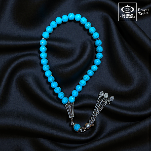 Main display view of AL INAM Firoza Tasbih ICH-0000-T13 handcrafted with genuine turquoise stones featuring vibrant blue tones and natural veined patterns, premium Islamic prayer beads for dhikr, duas, Ramadan, Hajj, Umrah and daily spiritual use.