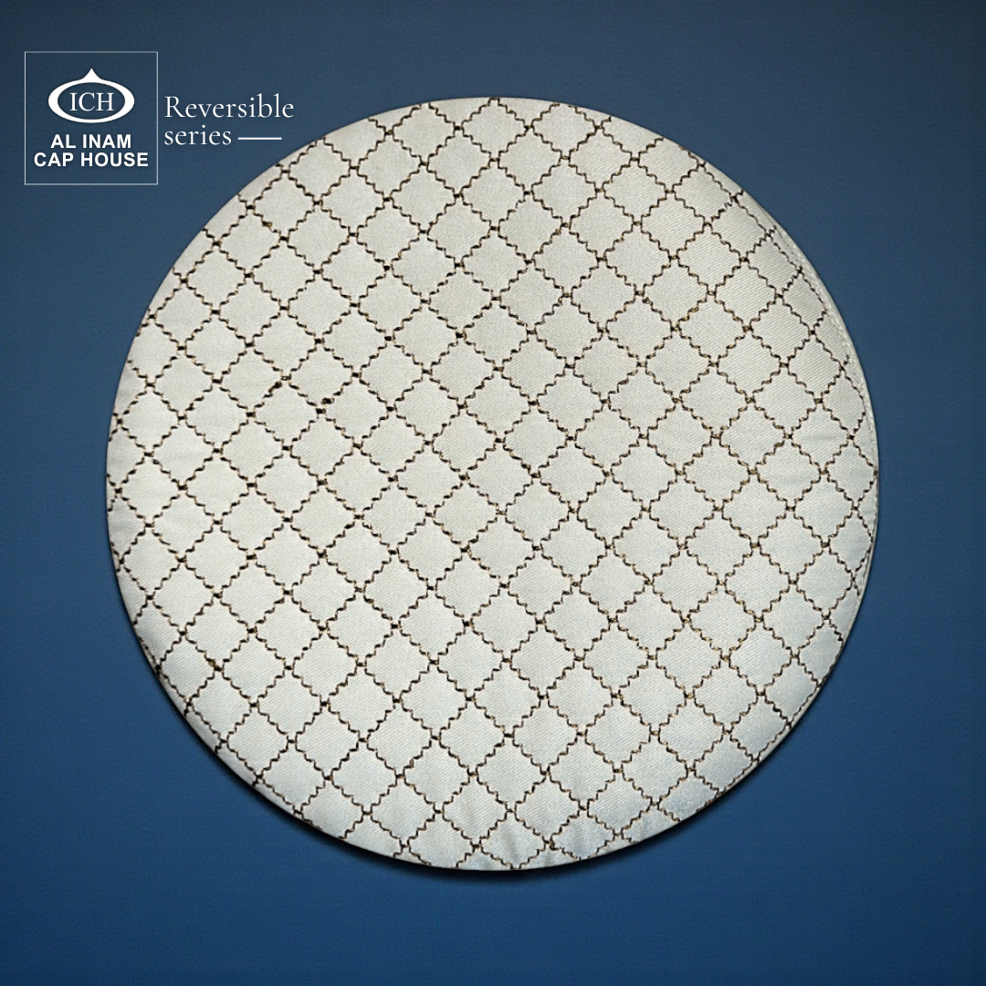 Top design view of AL INAM ICH Reversible Islamic Prayer Cap featuring symmetrical textured detailing, high-quality cotton fabric construction and comfortable skull cap fit for Muslim men during daily prayers.