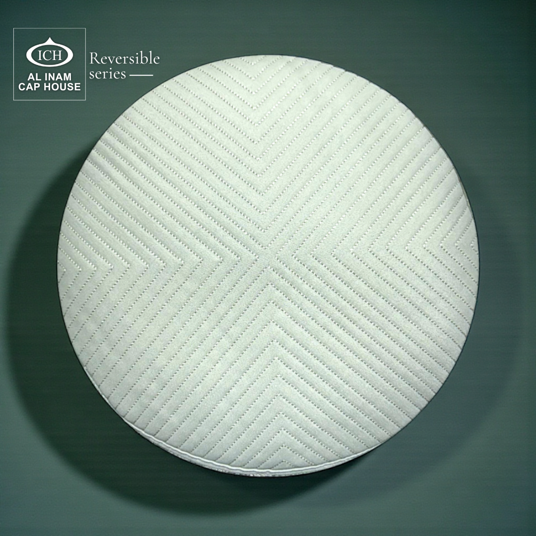 Top design detail of AL INAM ICH Reversible Islamic Prayer Cap showcasing symmetrical woven texture, breathable cotton construction and lightweight skull cap comfort for Muslim men during prayers.