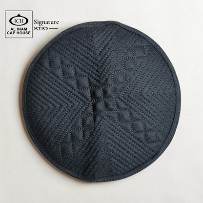 Top detail view of AL INAM Islamic Prayer Cap featuring clean textured pattern, premium craftsmanship and lightweight breathable skull cap comfort for Muslim men during daily prayers.