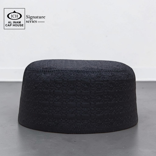 Front view of AL INAM Black Islamic Prayer Cap ICH-0000-A13 made with soft breathable cotton fabric, classic kufi skull cap for Muslim men, lightweight comfortable for namaz, Jummah prayer, Eid and daily wear.