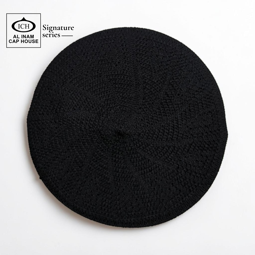 Top view of AL INAM Black Islamic Prayer Cap featuring neat textured pattern, breathable cotton construction and lightweight kufi comfort.