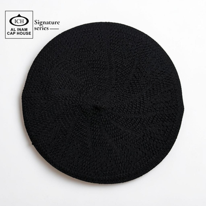 Top view of AL INAM Black Islamic Prayer Cap featuring neat textured pattern, breathable cotton construction and lightweight kufi comfort.