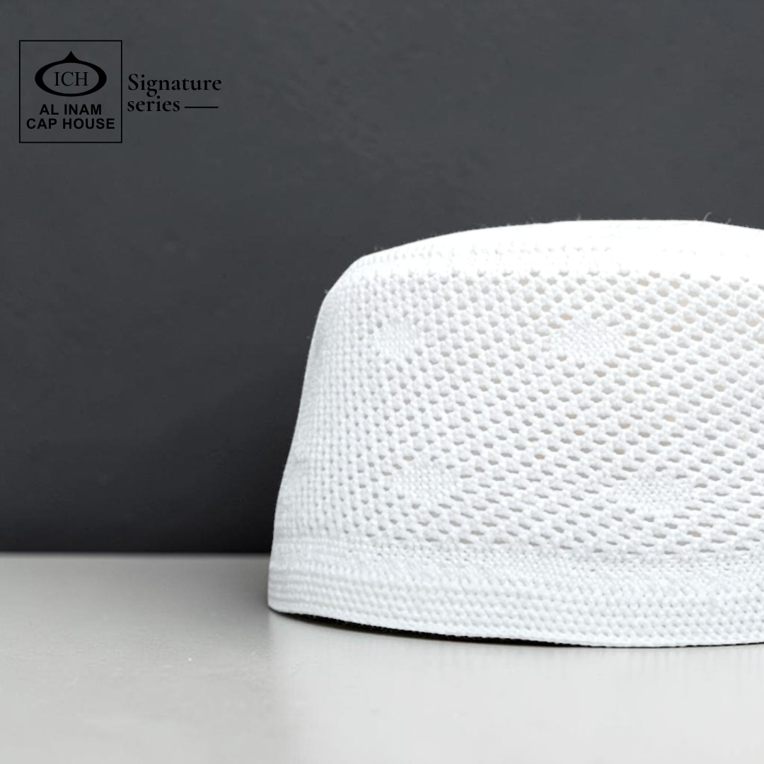 Side profile view of AL INAM White Islamic Prayer Cap showing structured fit, fine stitching and breathable cotton material for comfortable skull cap use.