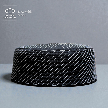 Front view of AL INAM ICH Black Reversible Islamic Prayer Cap ICH-0000-A18 crafted in premium breathable fabric with elegant geometric pattern, stylish black kufi cap for Muslim men, perfect for namaz, Jummah, Eid and daily wear.