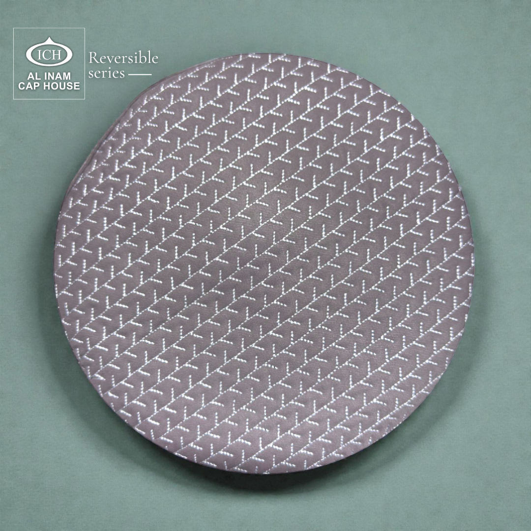 Top view of AL INAM ICH Grey Reversible Islamic Prayer Cap displaying symmetrical geometric pattern, premium craftsmanship, breathable lightweight kufi cap for Muslim men.