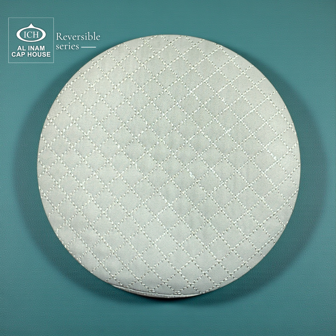 Top pattern detail of AL INAM ICH Reversible Islamic Prayer Cap featuring symmetrical woven craftsmanship, breathable cotton construction and lightweight skull cap design for Muslim men.