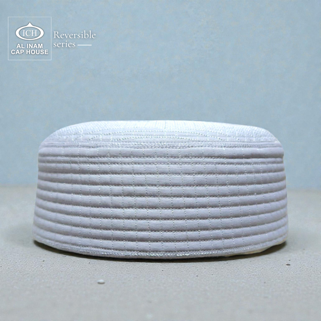Front style view of AL INAM ICH Reversible Islamic Prayer Cap ICH-00001-A23 crafted with premium breathable cotton fabric, elegant woven detailing, lightweight and comfortable kufi skull cap for Muslim men, perfect for namaz, Friday prayer, Eid and everyday Islamic wear.