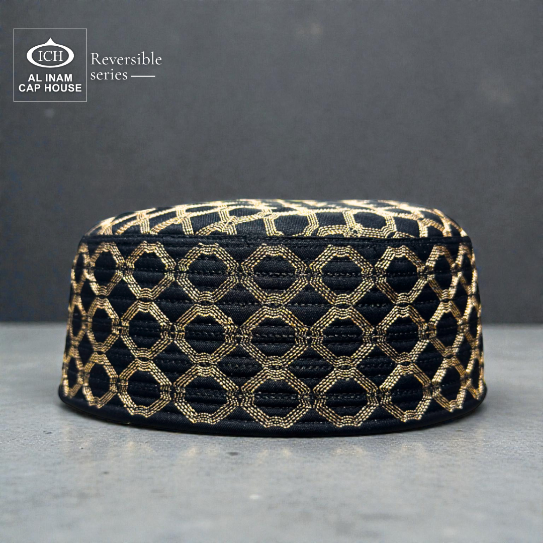 Front view of AL INAM ICH Reversible Islamic Prayer Cap ICH-00001-A26 in black and gold color crafted from premium breathable cotton fabric, lightweight kufi skull cap for Muslim men ideal for namaz, Jummah, Eid and daily Islamic wear.