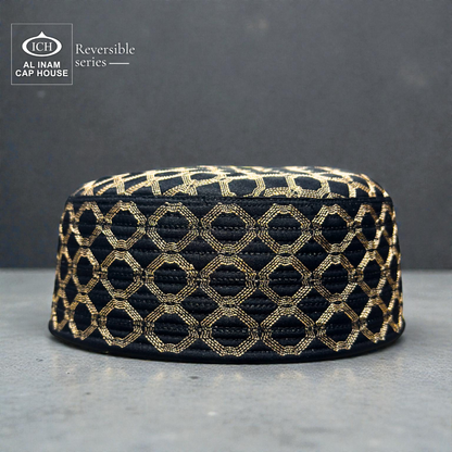 Front view of AL INAM ICH Reversible Islamic Prayer Cap ICH-00001-A26 in black and gold color crafted from premium breathable cotton fabric, lightweight kufi skull cap for Muslim men ideal for namaz, Jummah, Eid and daily Islamic wear.