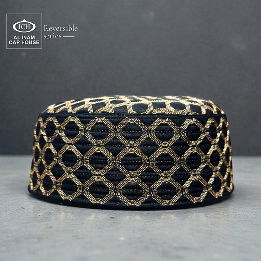 Front view of AL INAM ICH Reversible Islamic Prayer Cap ICH-00001-A26 in black and gold color crafted from premium breathable cotton fabric, lightweight kufi skull cap for Muslim men ideal for namaz, Jummah, Eid and daily Islamic wear.