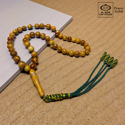 Main display view of AL INAM Koka Tasbih ICH-0000-T10 handcrafted with authentic Kokka wood beads featuring natural wooden grain textures, premium Islamic prayer beads for dhikr, duas, Ramadan, Hajj, Umrah and daily spiritual use.