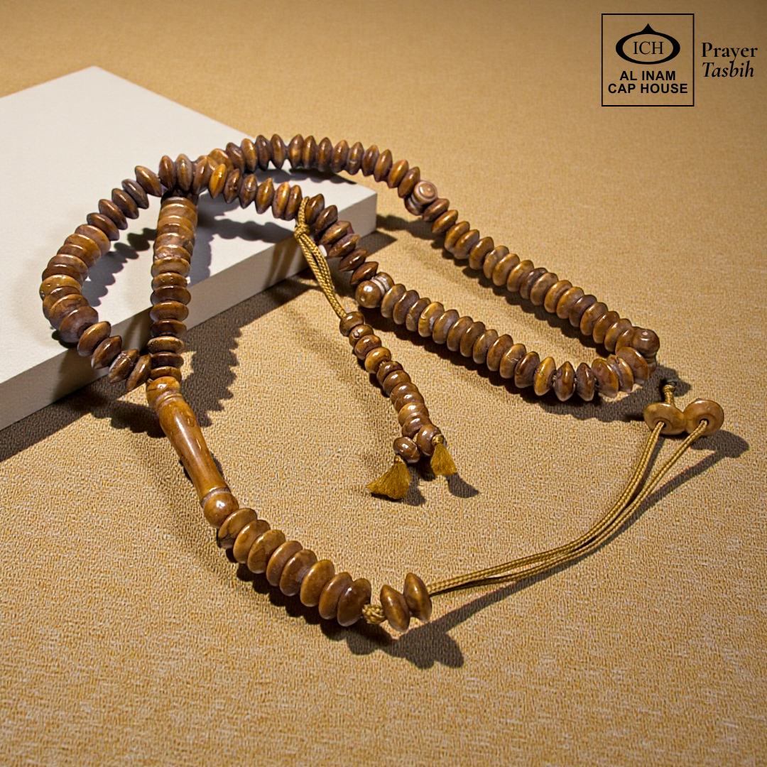 Main display view of AL INAM Koka Tasbih ICH-0000-T11 handcrafted with authentic Kokka wood beads featuring rich natural wooden tones and grain patterns, premium Islamic prayer beads for dhikr, duas, Ramadan, Hajj, Umrah and daily spiritual use.