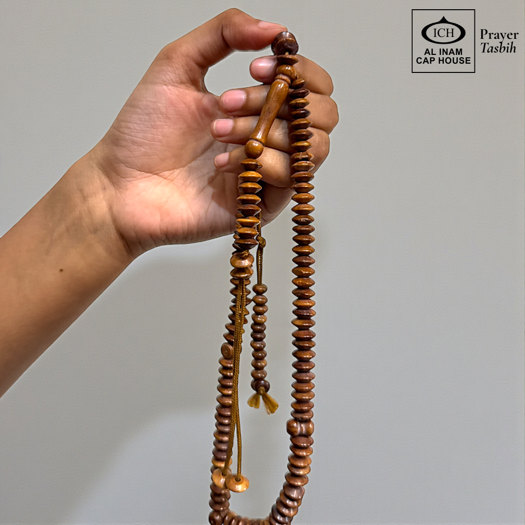 Spiritual use view of AL INAM Koka Tasbih crafted with authentic Kokka wood beads imported from Turkey, elegant Islamic zikr accessory ideal for Ramadan gifting, Eid, Hajj, Umrah and spiritual gatherings.