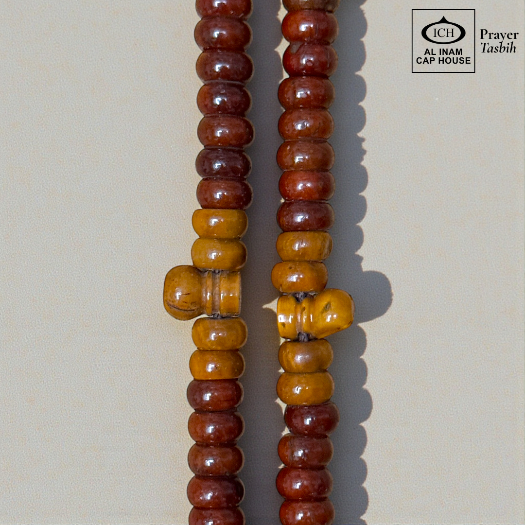 Close-up detail of AL INAM Koka Tasbih highlighting natural Kokka wood grain textures, smooth handcrafted finish and premium Islamic dhikr beads craftsmanship.