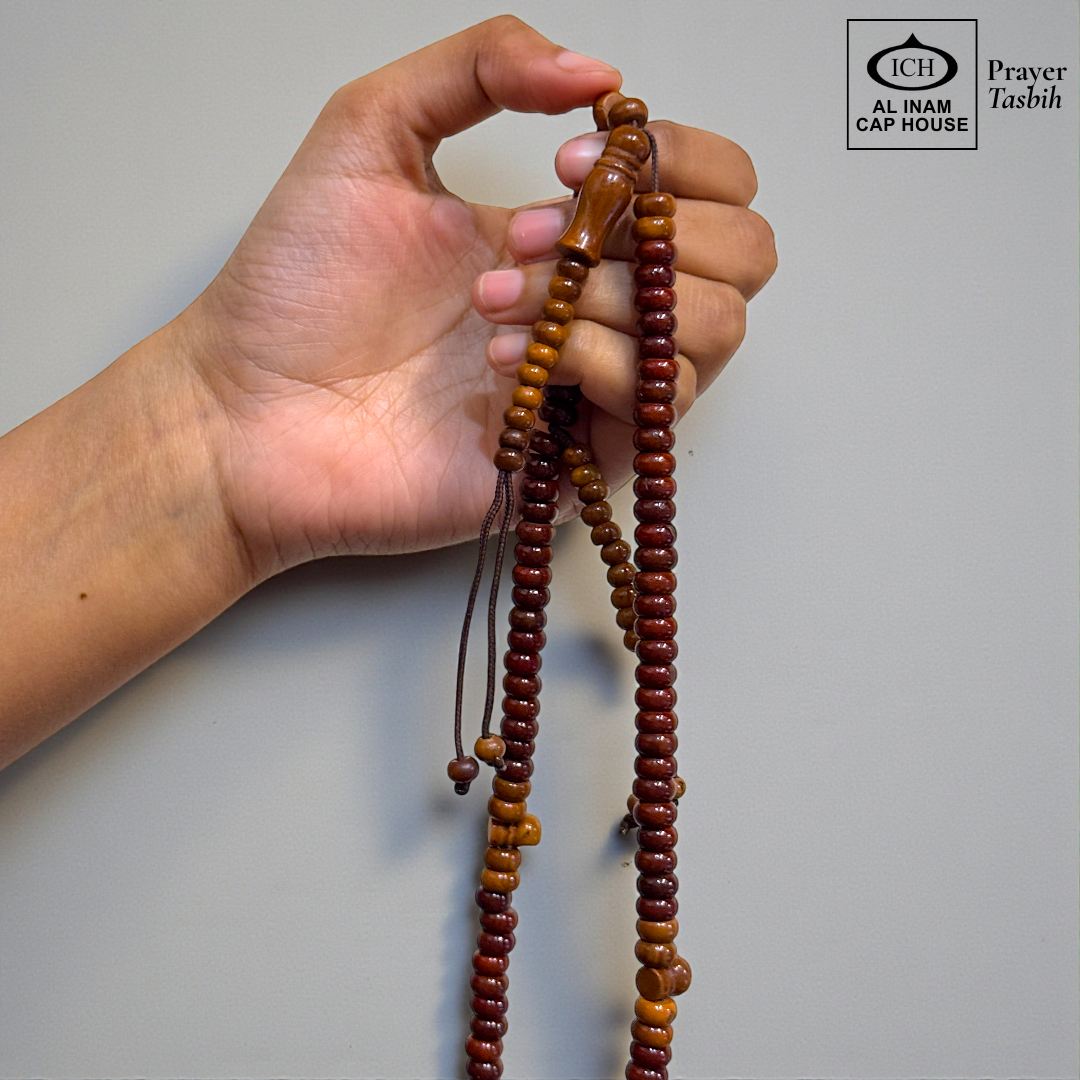 Spiritual use view of AL INAM Koka Tasbih crafted with authentic Kokka wood beads imported from Turkey, elegant Islamic zikr accessory ideal for Ramadan gifting, Eid, Hajj, Umrah and spiritual gatherings.
