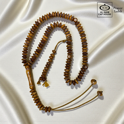 Full angle view of AL INAM Koka Islamic Tasbih showcasing smooth handcrafted Kokka wood beads, traditional Muslim prayer bead craftsmanship and lightweight comfortable design for zikr and meditation.