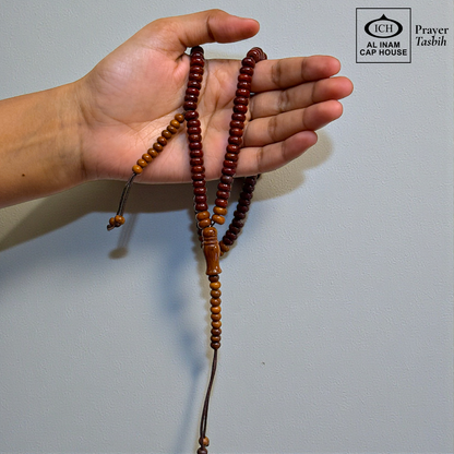 Handheld display angle of AL INAM Koka Islamic Prayer Tasbih showing lightweight balanced wooden bead arrangement, comfortable grip and durable craftsmanship for daily tasbeeh recitation and duas.