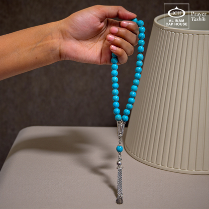Handheld display angle of AL INAM Firoza Islamic Prayer Tasbih showing lightweight balanced bead arrangement, smooth comfortable grip and durable craftsmanship for daily tasbeeh recitation and duas.
