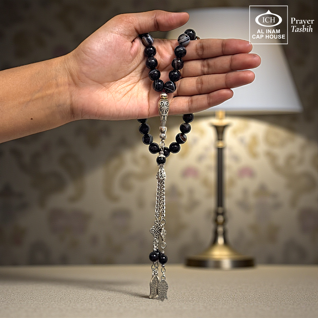 Handheld display angle of AL INAM Aqeeq Hakik Islamic Prayer Tasbih showing lightweight balanced bead arrangement, comfortable grip and durable craftsmanship for daily tasbeeh recitation and duas.