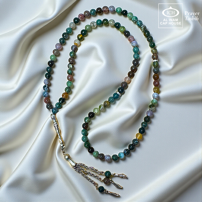 Full angle view of AL INAM Sulemani Aqeeq Islamic Tasbih showcasing polished agate beads, elegant silver toned tassel detailing and traditional Muslim prayer bead design for zikr and meditation.