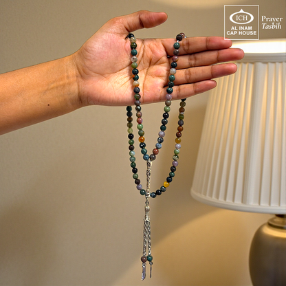 Handheld display angle of AL INAM Sulemani Aqeeq Islamic Prayer Tasbih showing lightweight balanced beads, comfortable grip and durable craftsmanship for daily tasbeeh recitation and duas