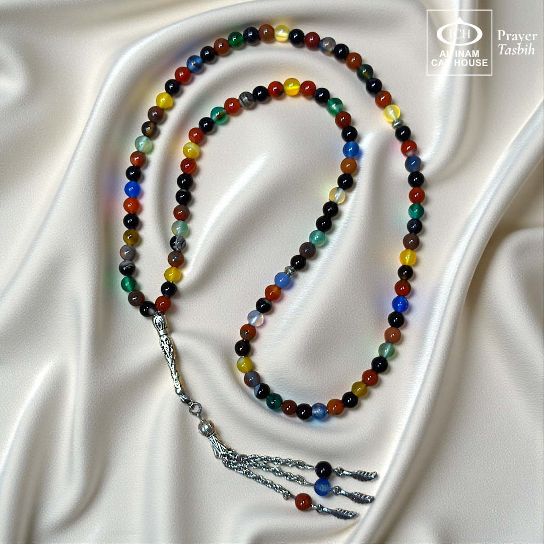 Full tasbih angle of AL INAM AQEEQ Islamic Prayer Tasbih showcasing polished agate beads, elegant silver toned tassel detailing and traditional Muslim prayer bead design for zikr and meditation.