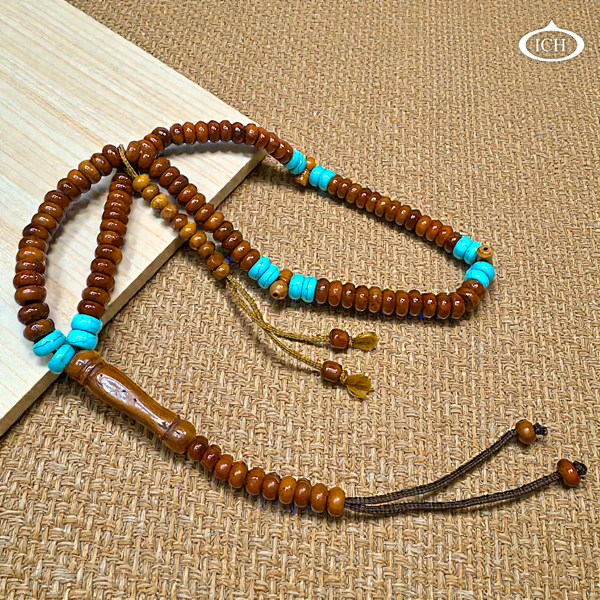 Premium wooden Islamic tasbih with turquoise accent beads – handcrafted Muslim prayer beads for dhikr, tasbeeh, and daily zikr.