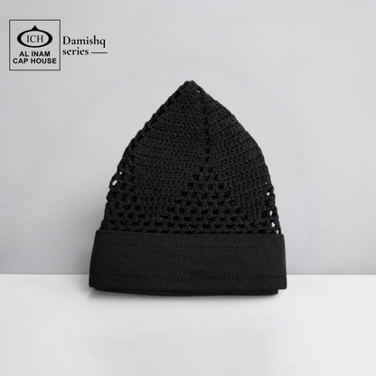 Front view of ICH Damishq Black Islamic Knitted Cap ICH-0000-N17 showcasing detailed knitted pattern, breathable fabric, comfortable fit and premium Muslim prayer cap for namaz, Jummah and daily wear.