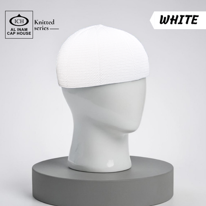 Dummy view of ICH Turkish White Islamic Knitted Cap ICH-0000-N21 featuring premium Turkish knitted craftsmanship, breathable cotton blend fabric, lightweight comfort and elegant kufi cap design for Muslim men, suitable for prayer and daily wear.